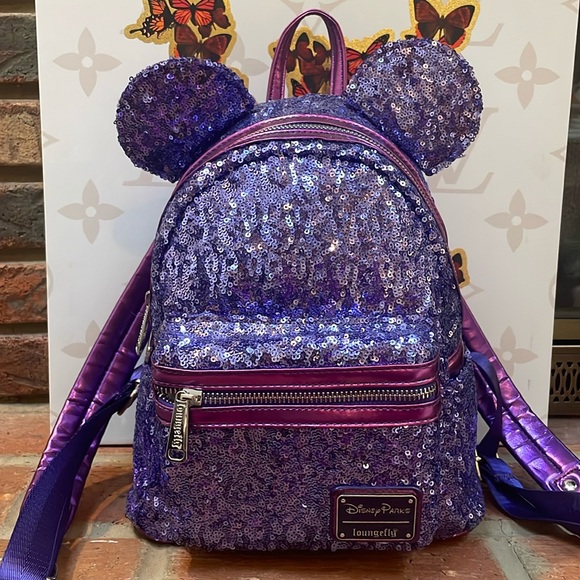 Loungefly Handbags - Disney Parks Loungefly Purple Potion Sequined Backpack